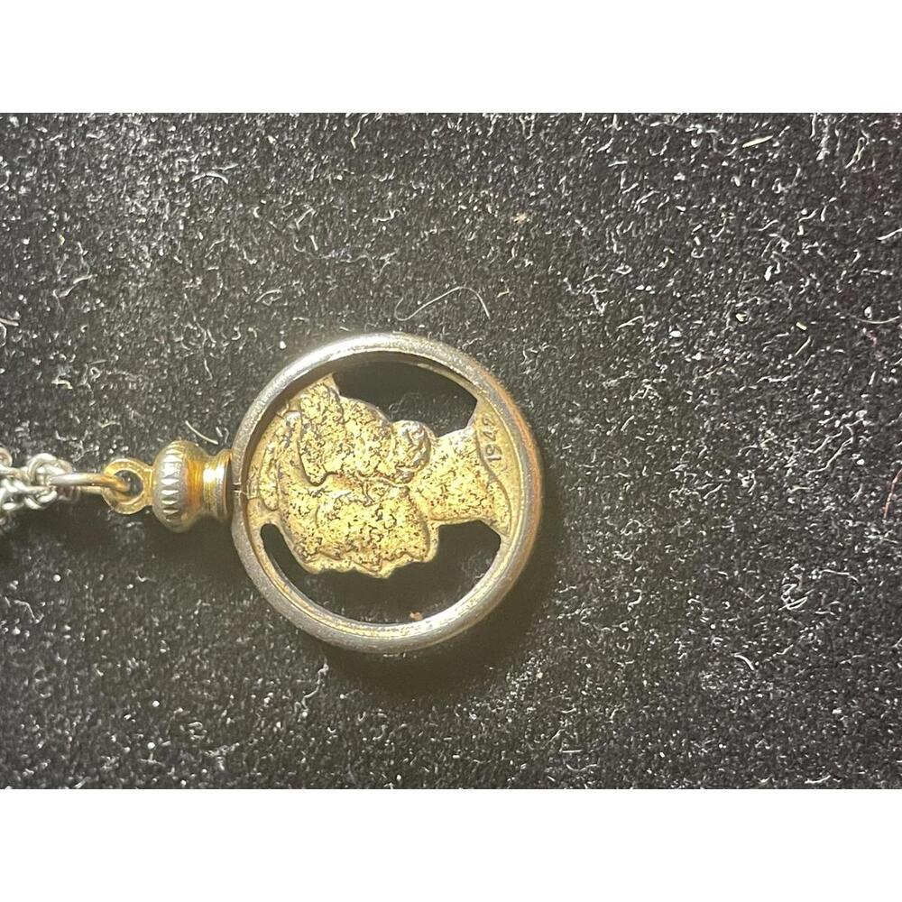 Vintage 1942 Mercury Dine Cutout Necklace